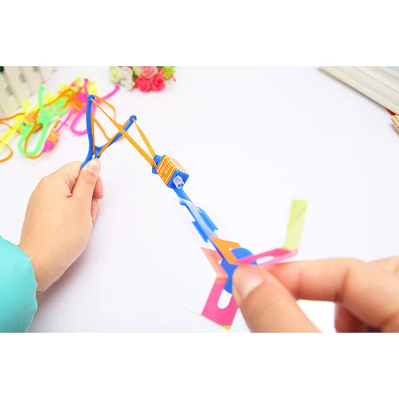 Amazing Light Toy Arrow LED Light Toys Outdoor Party Fun Gift Rubber Band Catapult Glow In The Dark Rocket Helicopter Flying Toy ALPENZO